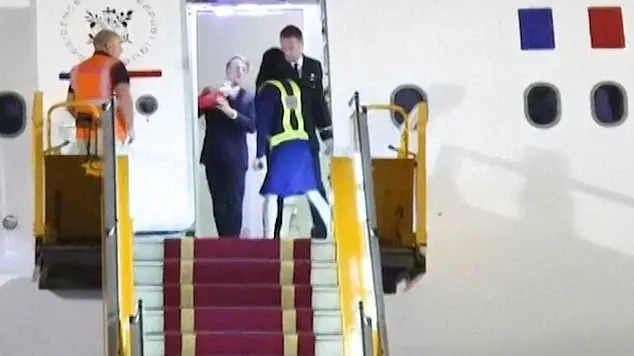 Conspiracy Theories Emerge After Macron's Unusual Attire at Davos, as Official Explanation of Health Issue Sparks Debate