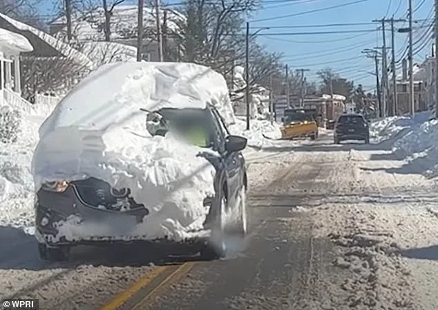Rhode Island Driver Sparks Outrage for Driving Snow-Buried Truck Post-Blizzard as Travel Ban Lifts