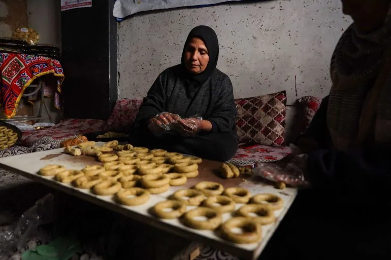Baking in rubble: Gaza woman keeps Eid traditions alive despite shortages