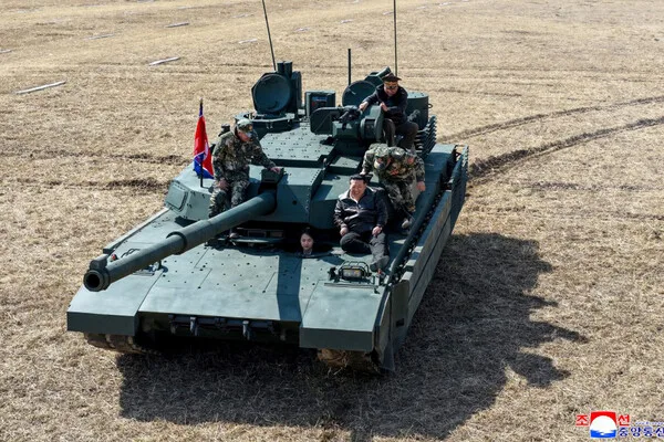 Kim Jong-un's Symbolic Display of Military Power as He Rides New Tank Model in North Korea